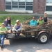 Our dairy princess parade team posing with our 2nd place eagle's nest float. From left: Erika, Lydia, Val, Grace, Emily, and Maggie. Interns pose with Dairy Princess parade float